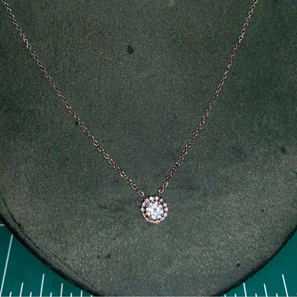 circle of love cubic zirconia surrounded by smaller ones on a sterling 925 chain